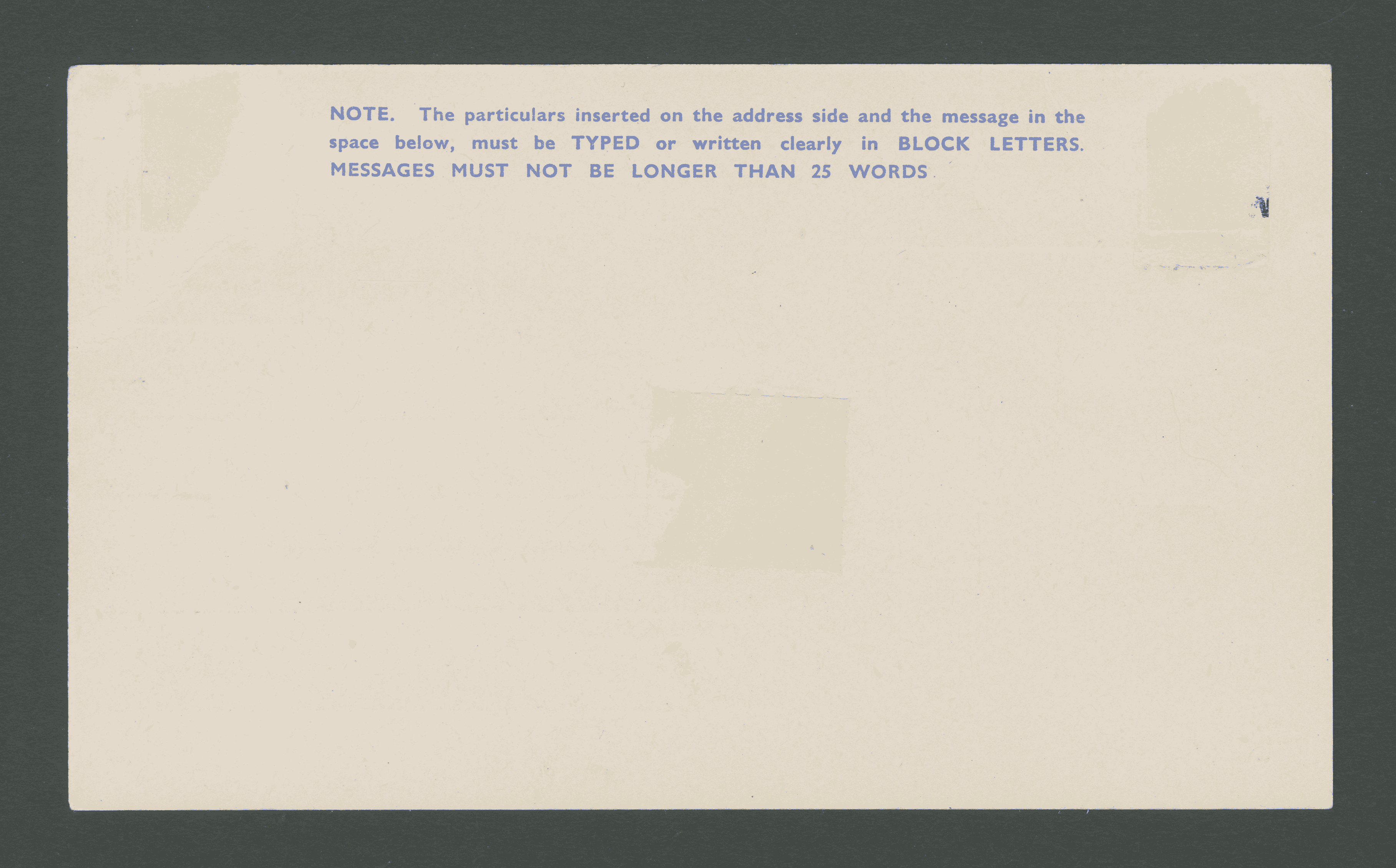 The plain back of the postcard leaves space for 25 words. It is specified at the top of the postcard that they be written in block capitals.